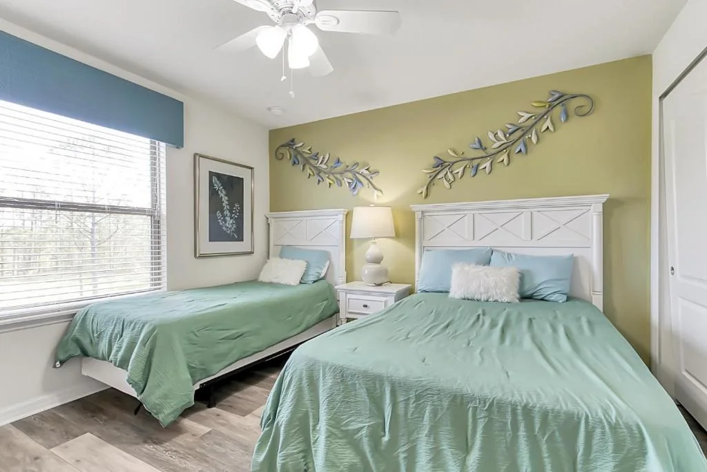 Guest bedroom with twin and queen beds